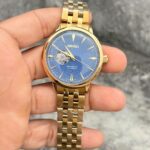 seiko blue dial golden chain automatic