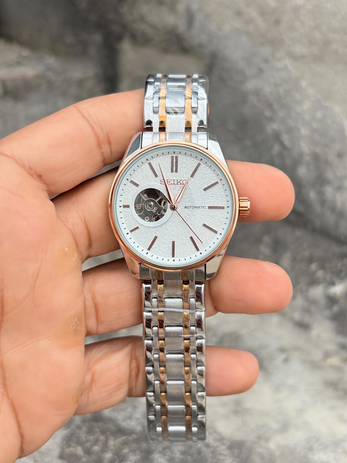 5a87333e-fb00-4f9b-aad0-6e3e0cb69d53 seiko white dial silver dual tone chain automatic - Image 1