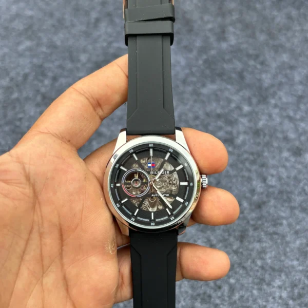 Tommy silver dial , silicon strap changed_