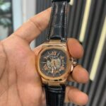 patek rose gold dial black leather strap